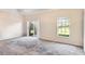 Bright living room featuring lots of natural light and sliding glass doors to a balcony at 1602 Eagle Pond Dr # 1602, Winter Haven, FL 33884
