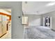 Open-concept living area with neutral tones, leading to outdoor patio at 1602 Eagle Pond Dr # 1602, Winter Haven, FL 33884