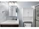 Bathroom featuring a single sink vanity, mirrored medicine cabinet, and toilet at 1610 Reynolds Rd # 72, Lakeland, FL 33801