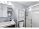 Bathroom featuring a single sink vanity, mirrored medicine cabinet, toilet, and shower at 1610 Reynolds Rd # 72, Lakeland, FL 33801