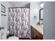 Bathroom featuring a single sink vanity, mirrored medicine cabinet, toilet, and shower at 1610 Reynolds Rd # 72, Lakeland, FL 33801