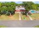 A front aerial view of the clubhouse and pool at 1610 Reynolds Rd # 72, Lakeland, FL 33801
