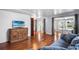 Comfortable living room featuring hardwood floors, modern furnishings and sliding glass doors to let natural light in at 1610 Reynolds Rd # 72, Lakeland, FL 33801