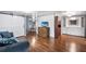 Spacious living room with hardwood floors, an open layout, and seamless flow to the dining area at 1610 Reynolds Rd # 72, Lakeland, FL 33801