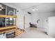 Enclosed patio featuring tile floors, white walls and ceiling, and a refrigerator at 1610 Reynolds Rd # 72, Lakeland, FL 33801