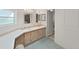 Well-lit bathroom with double sinks, ample storage, and a separate toilet area at 1746 Fox Hill Dr, Lakeland, FL 33810