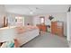 Comfortable bedroom showing furniture and with an attached bathroom for added convenience at 1746 Fox Hill Dr, Lakeland, FL 33810