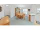 Inviting dining area with a chandelier, natural light, and plenty of space for gatherings and entertaining at 1746 Fox Hill Dr, Lakeland, FL 33810