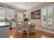 Charming dining area with a round table, wicker chairs, and natural light at 195 E Conant St, Bartow, FL 33830