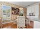 Bright dining area with white cabinets, granite countertops, and natural light at 195 E Conant St, Bartow, FL 33830