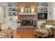 Cozy fireplace surrounded by built-in shelving in a comfortable living space at 195 E Conant St, Bartow, FL 33830