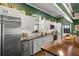 Bright kitchen featuring white cabinetry, stainless steel appliances, and an island with a wood countertop at 195 E Conant St, Bartow, FL 33830