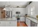 Well-appointed kitchen featuring granite countertops, stainless appliances, and custom cabinetry at 195 E Conant St, Bartow, FL 33830
