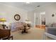Inviting living room offering natural light, plush seating, and adjacent dining space at 195 E Conant St, Bartow, FL 33830