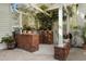 Brick outdoor kitchen area with grill, counter space, and lush landscaping at 195 E Conant St, Bartow, FL 33830