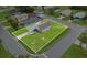 Aerial shot outlining home, showcasing the house's placement on a well-maintained property at 2020 Bassedena W Cir, Lakeland, FL 33805
