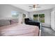 The bedroom boasts a calming color scheme, modern windows and provides comfortable sleeping quarters at 2020 Bassedena W Cir, Lakeland, FL 33805