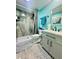 Bathroom features a new walk-in shower, sleek vanity, and modern fixtures at 2055 S Floral Ave # 11, Bartow, FL 33830