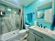 Bathroom features a new walk-in shower, sleek vanity, and modern fixtures at 2055 S Floral Ave # 11, Bartow, FL 33830