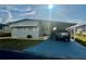 Charming single-story home with covered parking and well-maintained landscaping at 2055 S Floral Ave # 11, Bartow, FL 33830