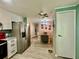 Open kitchen and dining area with modern appliances and stylish décor at 2055 S Floral Ave # 11, Bartow, FL 33830
