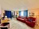 Cozy living room featuring comfortable seating, modern flooring, and natural light at 2055 S Floral Ave # 11, Bartow, FL 33830