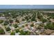 Beautiful aerial shot of a residential area with lush greenery, showcasing the home's desirable location and neighborhood at 210 Citrus Dr, Winter Haven, FL 33884