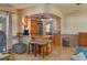 View of a well-lit kitchen featuring a breakfast bar with seating and stainless steel appliances at 210 Citrus Dr, Winter Haven, FL 33884