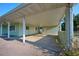 Spacious carport provides covered parking and direct access to the home, plus a convenient side door entrance at 219 Willow St, Lake Wales, FL 33859