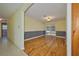 Inviting dining room featuring hardwood floors and an open archway to the living room at 219 Willow St, Lake Wales, FL 33859