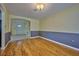 Cozy dining area with hardwood floors and an open design for entertaining and dining at 219 Willow St, Lake Wales, FL 33859