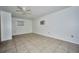 Spacious living room with tile floors and neutral walls, showcasing a blank canvas at 219 Willow St, Lake Wales, FL 33859