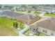 Home with solar panels, landscaping, and a white fence providing a comfortable environment for outdoor enjoyment at 249 Haines Blvd, Winter Haven, FL 33881