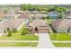 Charming single-Gathering home featuring a well-manicured lawn, two-car garage, and solar panels at 249 Haines Blvd, Winter Haven, FL 33881