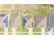Property featuring solar panels, a barbecue area, and landscaping in a well-planned neighborhood at 249 Haines Blvd, Winter Haven, FL 33881