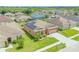 Inviting single-Gathering home featuring solar panels, a manicured lawn, and comfortable neighborhood setting at 249 Haines Blvd, Winter Haven, FL 33881