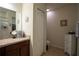 Bathroom featuring a vanity with ample counter space and storage, plus access to a shower at 249 Haines Blvd, Winter Haven, FL 33881