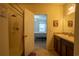 Bathroom with shower, vanity and view into the bedroom at 249 Haines Blvd, Winter Haven, FL 33881