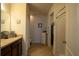 Bathroom featuring granite counters, tile floors, and a separate shower and toilet area at 249 Haines Blvd, Winter Haven, FL 33881