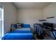 Bedroom featuring a single bed, desk, and window at 249 Haines Blvd, Winter Haven, FL 33881