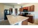 Well-equipped kitchen with stainless steel appliances, pantry, and a convenient center island at 249 Haines Blvd, Winter Haven, FL 33881