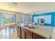 Bright open floor plan kitchen area connected to dining and living areas at 249 Haines Blvd, Winter Haven, FL 33881
