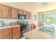Efficient kitchen design with essential appliances and ample counter space at 249 Haines Blvd, Winter Haven, FL 33881