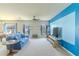 Bright living room with neutral carpet and a distinctive accent wall at 249 Haines Blvd, Winter Haven, FL 33881