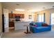 Open floor plan showcasing the kitchen and living room with natural light and neutral tones at 249 Haines Blvd, Winter Haven, FL 33881