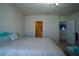 Cozy main bedroom featuring neutral walls and a comfortable king-sized bed with plush pillows at 249 Haines Blvd, Winter Haven, FL 33881