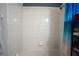 Clean, white tiled shower and tub combination at 249 Haines Blvd, Winter Haven, FL 33881