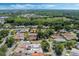 An aerial shot captures the neighborhood's serene setting, close to nature preserves and scenic views at 259 Mariposa, Winter Haven, FL 33884