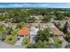 An aerial perspective of houses with lush lawns and gardens, creating a serene residential environment at 259 Mariposa, Winter Haven, FL 33884