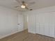 Spacious bedroom with ample closet space and neutral decor at 259 Mariposa, Winter Haven, FL 33884